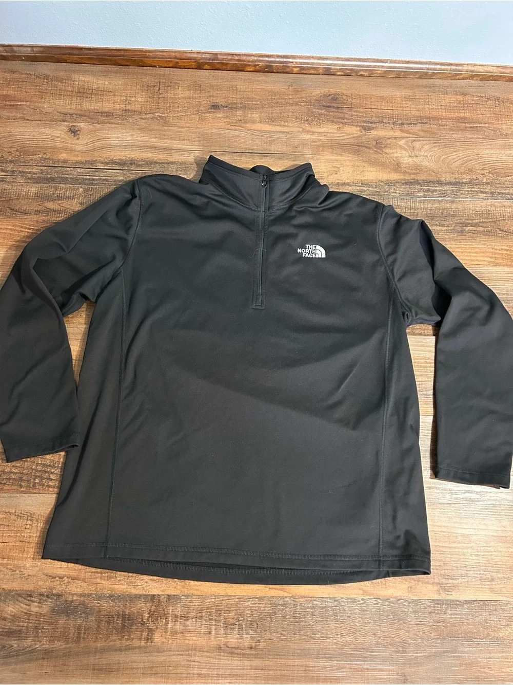 The North Face Men’s Black Quarter-Zip Pullover sweatshirt